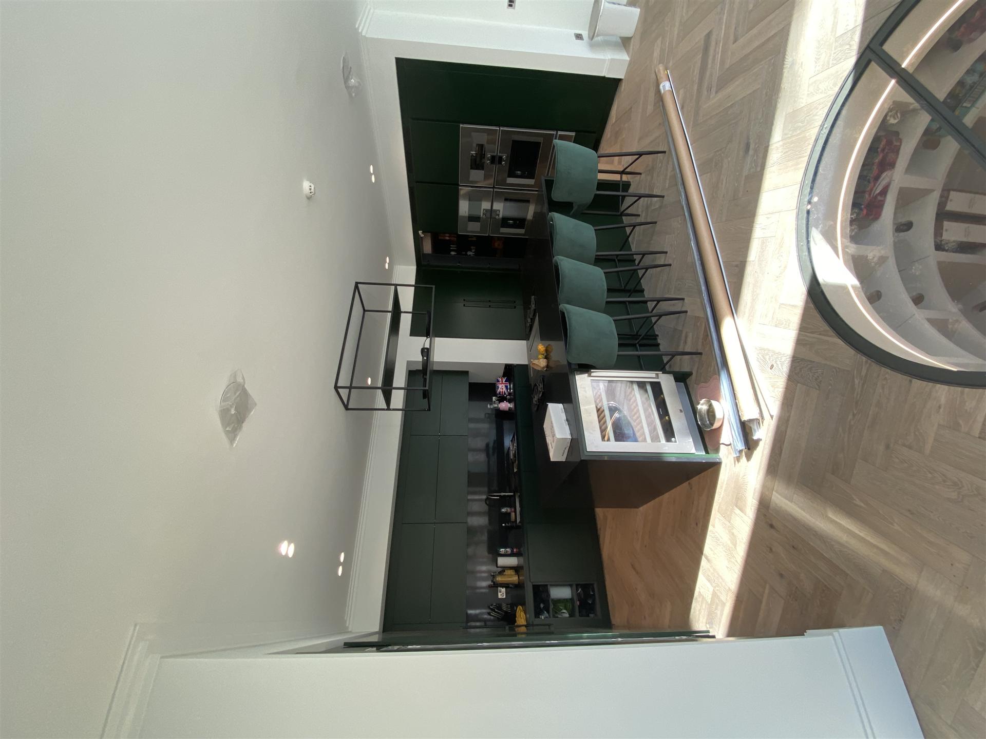 Dark green kitchen open plan living, Essex